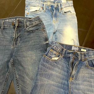 3 pair of boy jeans practically brand new. Size 7 light wash n size 8 dark wash